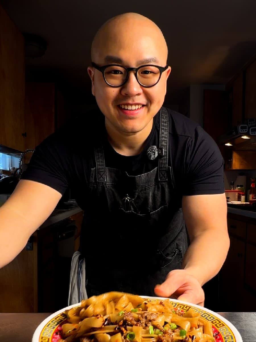 Chef Fatty presenting a fresh dish