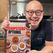 Charles holding Chopsticks Optional